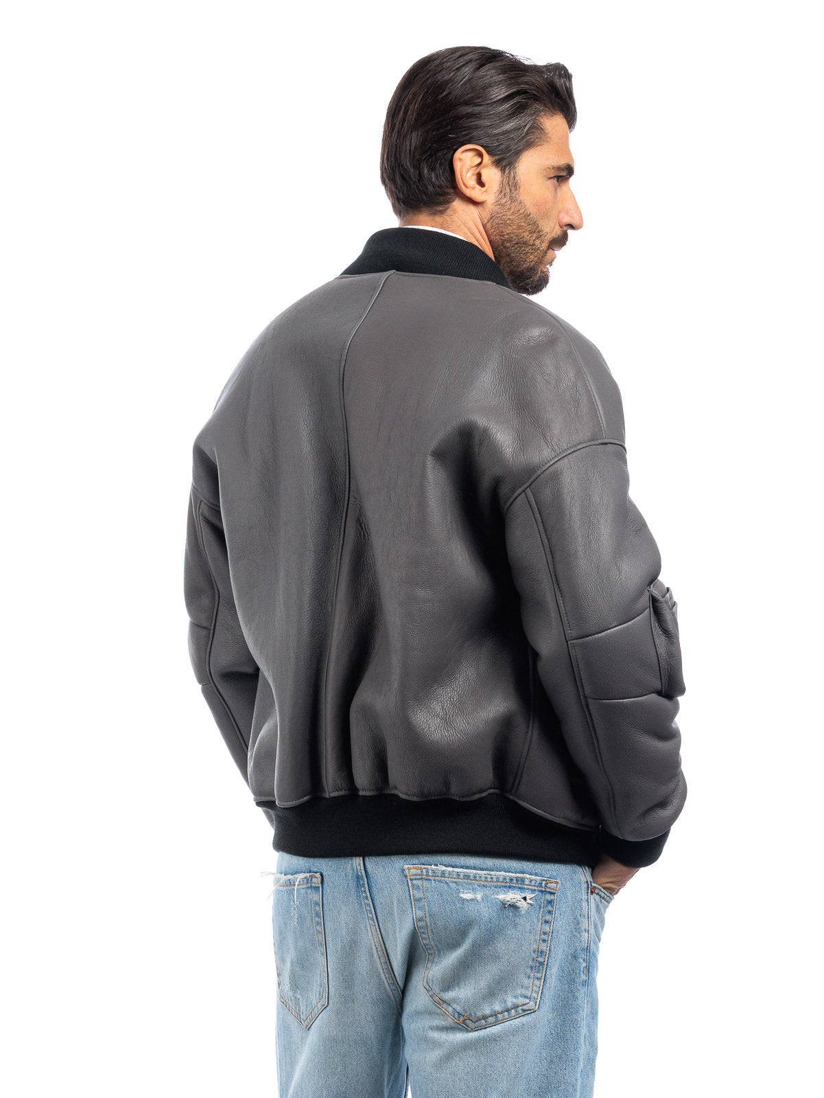 Bomber interamente in montone grigio pelo nero con tasca - linea OVER