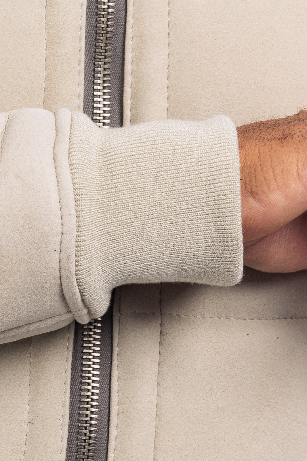 Bomber interamente in montone idrorepellente sabbia pelo bianco uomo con zip