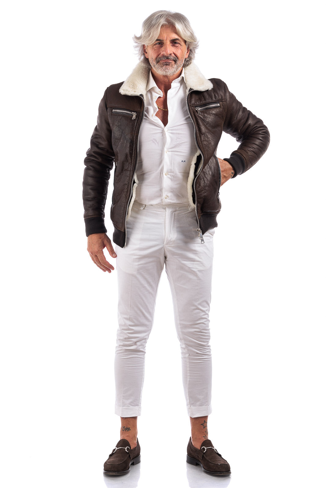 Bomber interamente in montone marrone pelo bianco con zip
