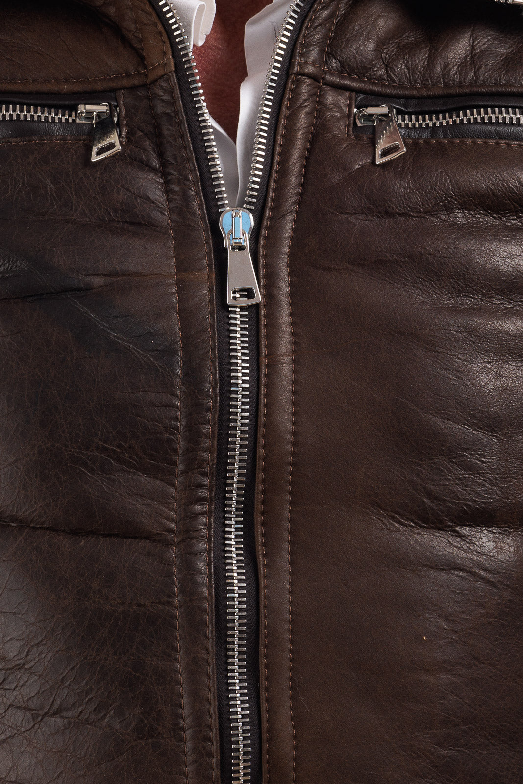 Bomber interamente in montone marrone pelo bianco con zip