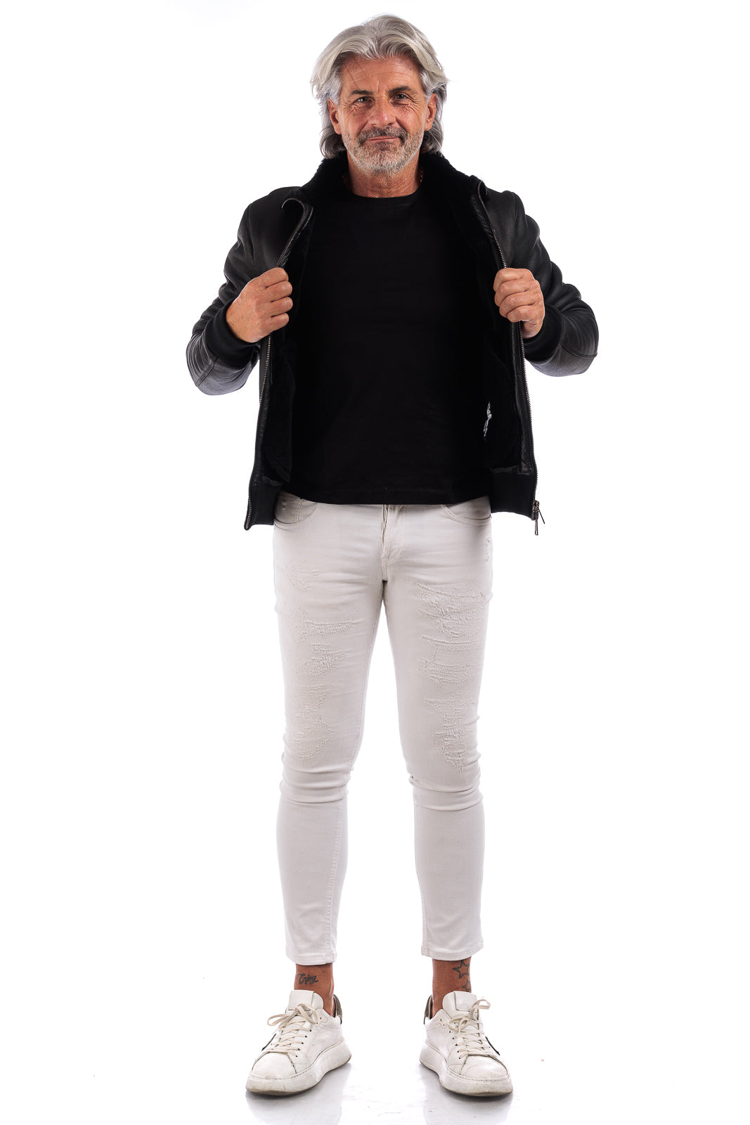 Bomber interamente in montone nero pelo nero con zip