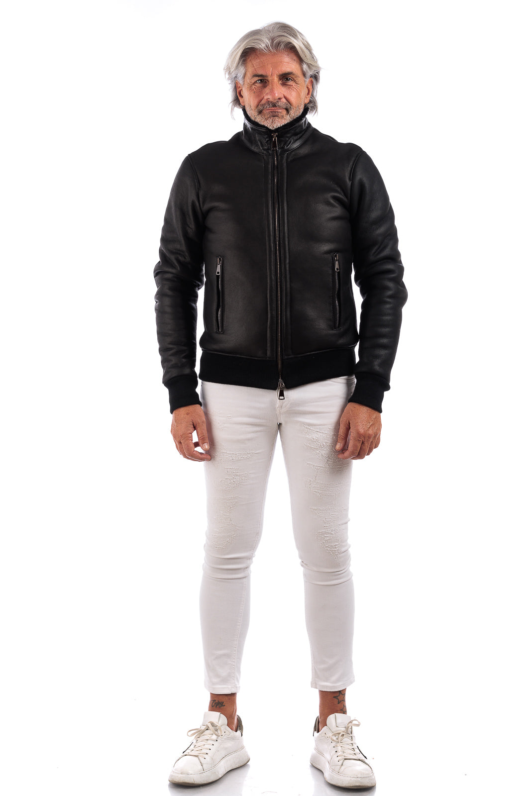 Bomber interamente in montone nero pelo nero con zip