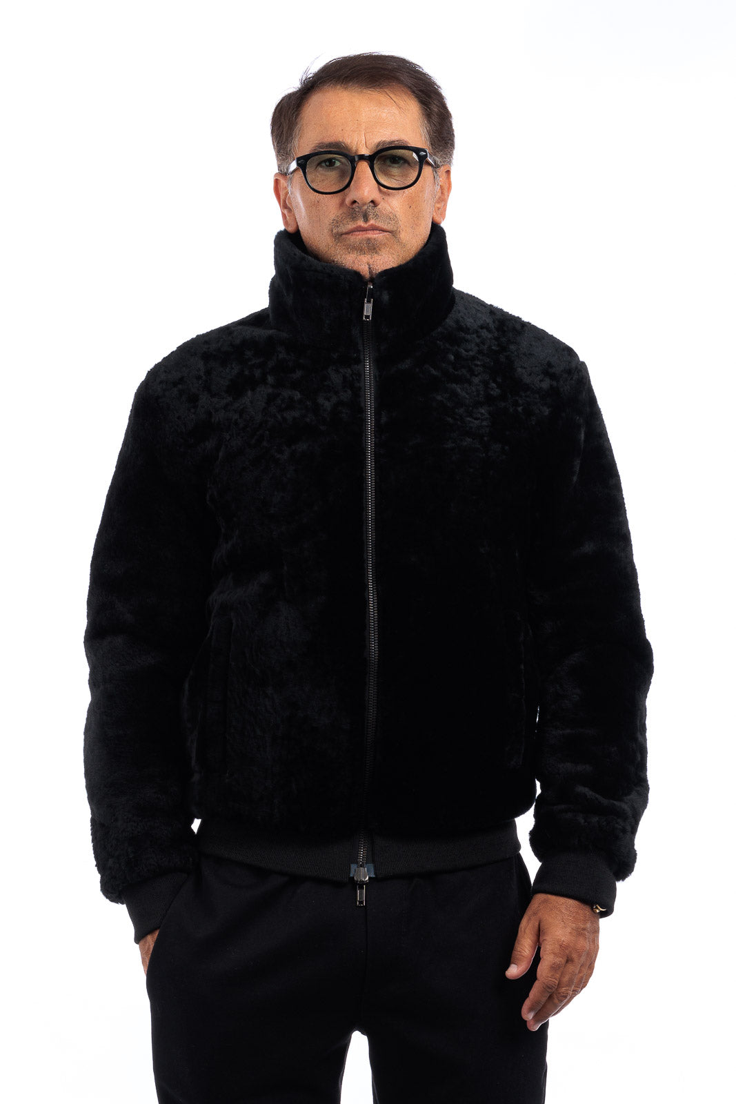 Bomber interamente in montone rovesciato nero con zip double face