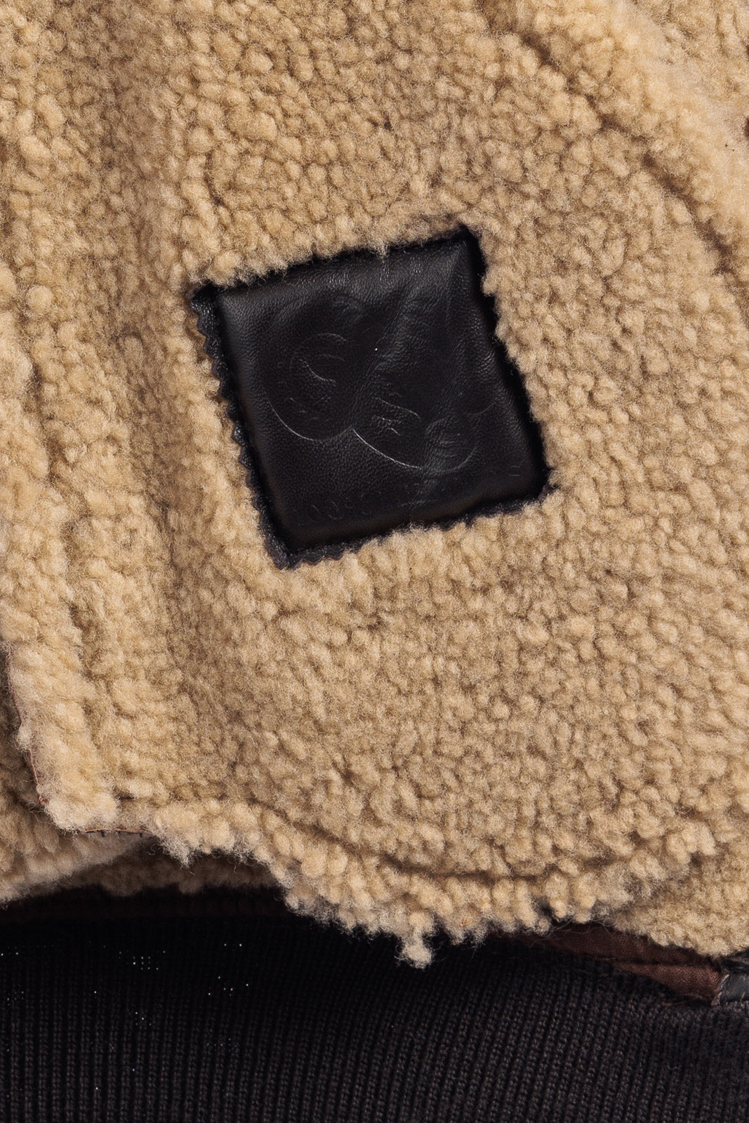 Bomber montone shearling testa di moro pelo beige con zip