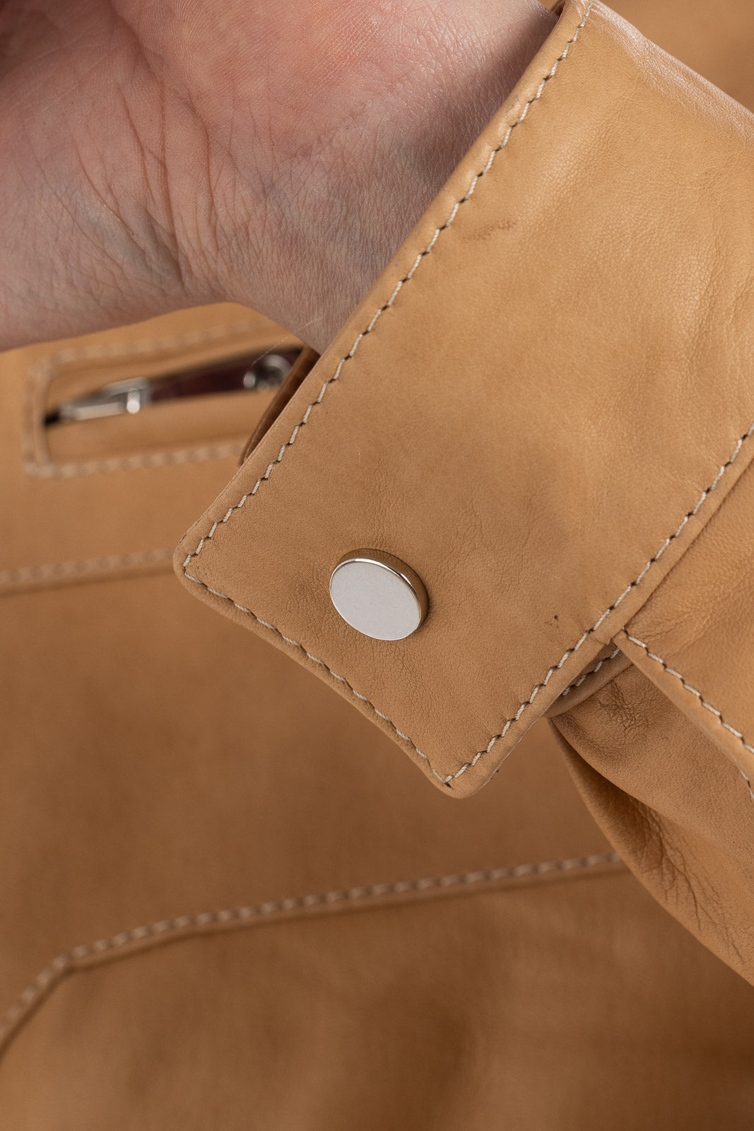 Giacca in pelle con zip sabbia trapuntata