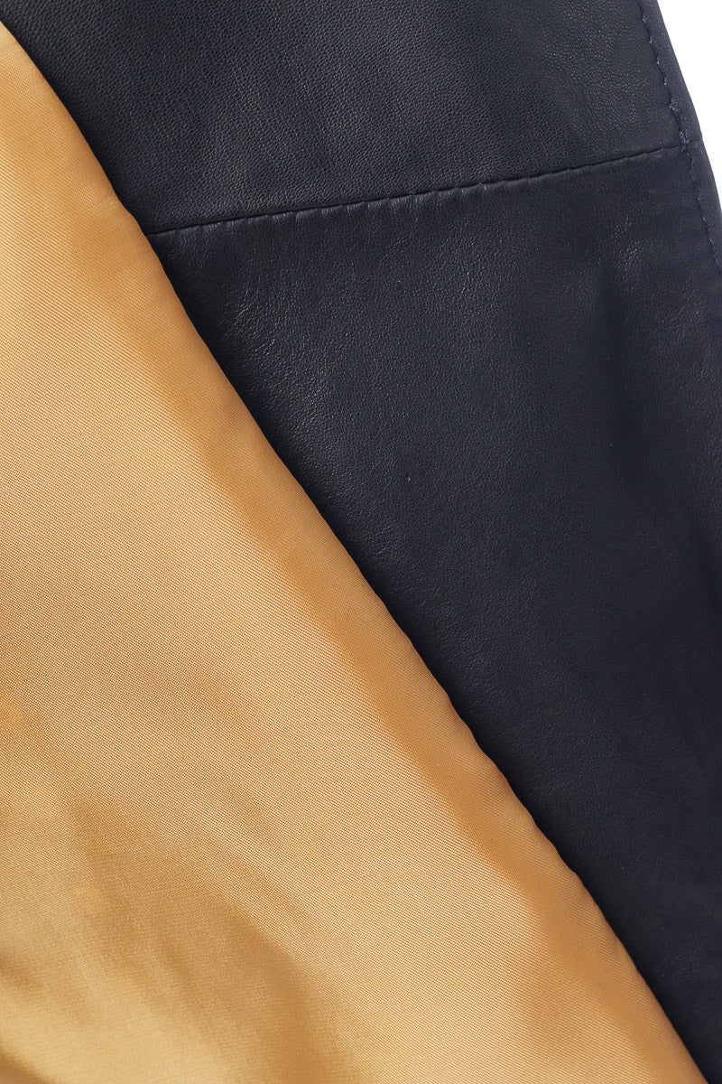 Smanicato in pelle nero accessori oro