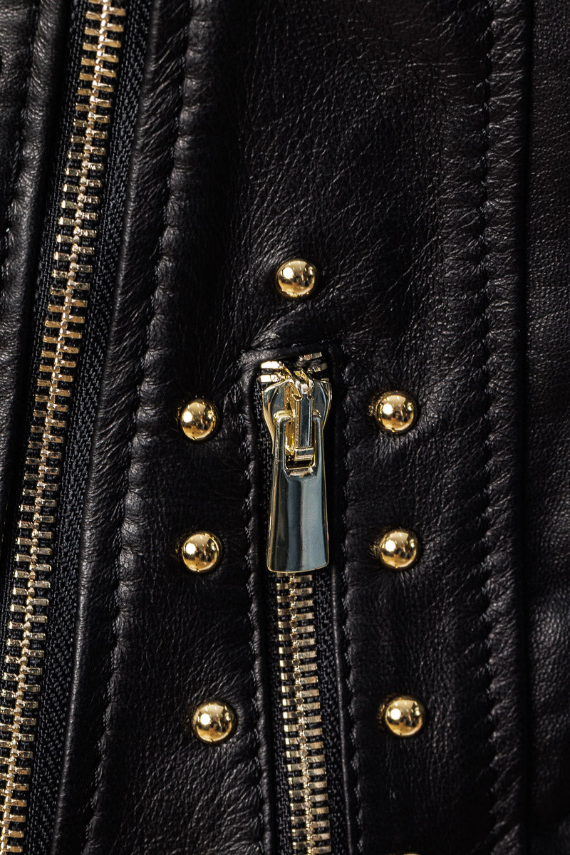 Smanicato in pelle nero accessori oro