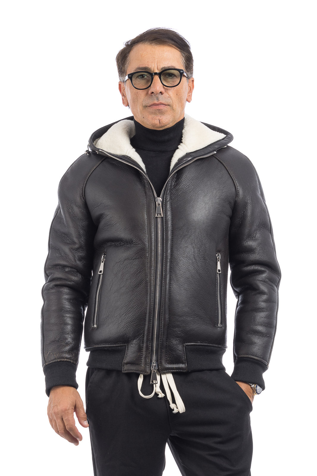 Bomber interamente in montone nero pelo bianco con zip e cappuccio REGLAN