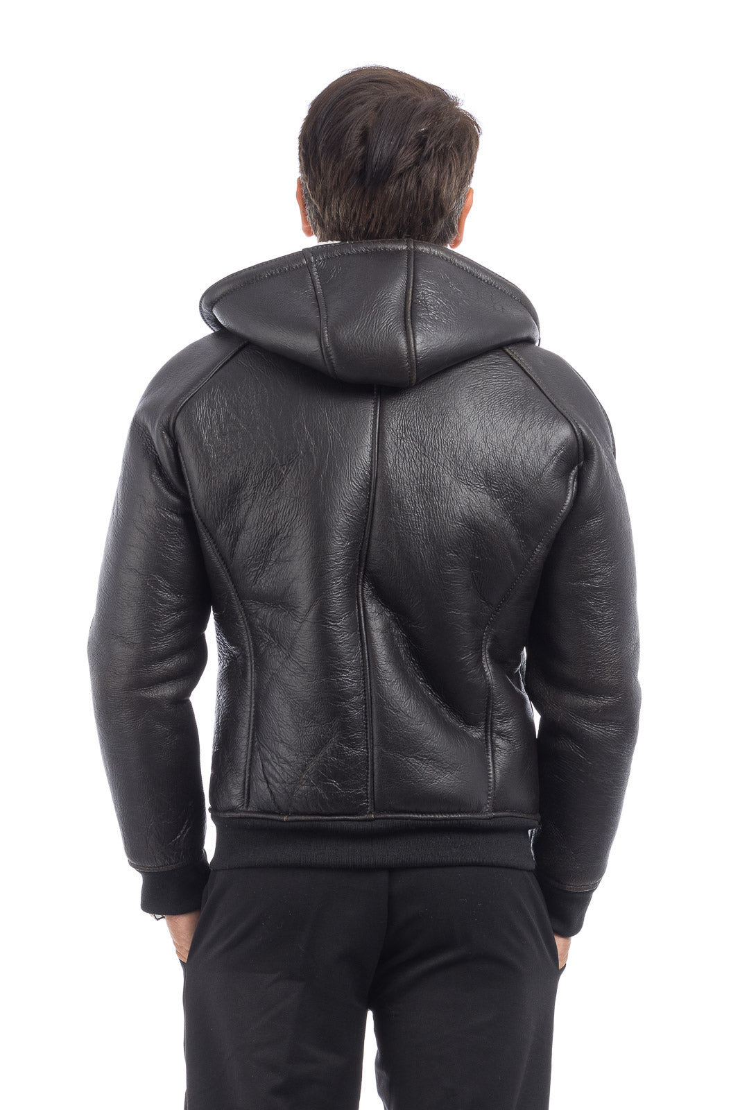 Bomber interamente in montone nero pelo bianco con zip e cappuccio REGLAN