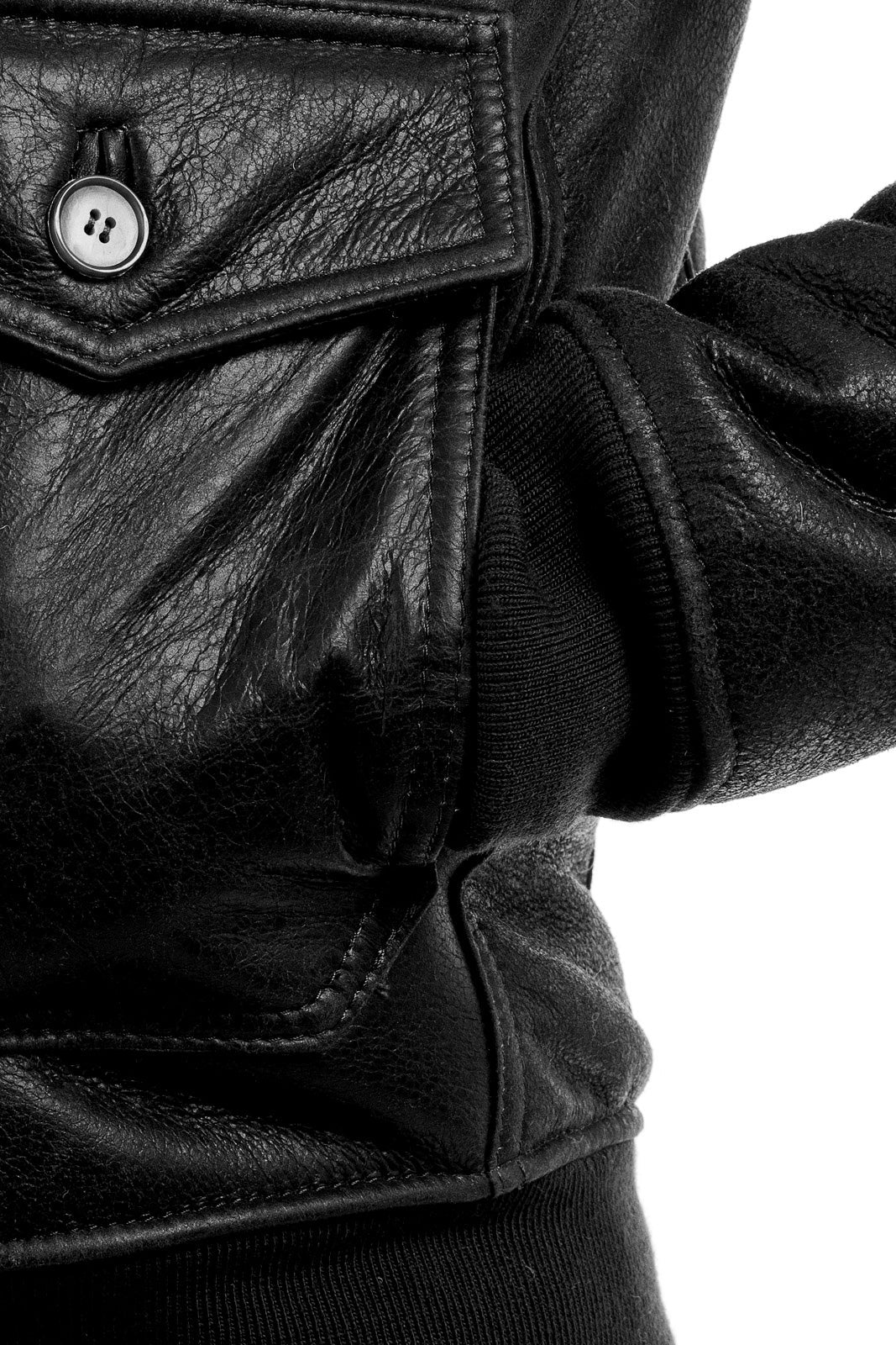 Bomber interamente in montone nero pelo bianco con zip VAST bambino